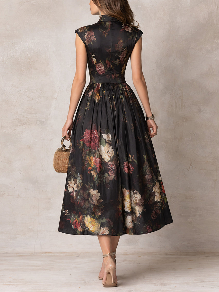 Patricia | Vestido midi plisado de satén floral negro